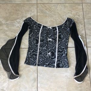 Chic French black and white top with ribbons.